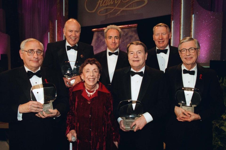 Academy of Television Arts & Sciences Hall of Fame inductees (from left) Fred Silverman, Carl Reiner, Ethel Winant, Lorne Michaels, Jim Lehrer, Robert MacNeil and Fred Rogers in 1999. REUTERS