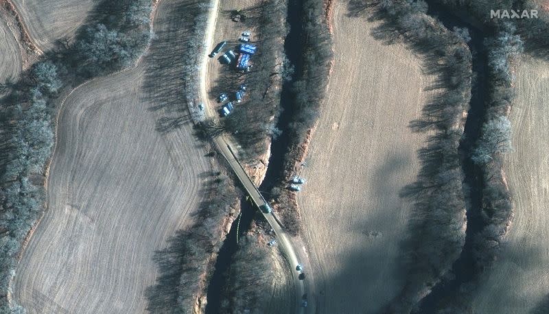 A satellite image shows emergency crews working to clean up crude oil pipeline spill along Mill Creek, in Kansas