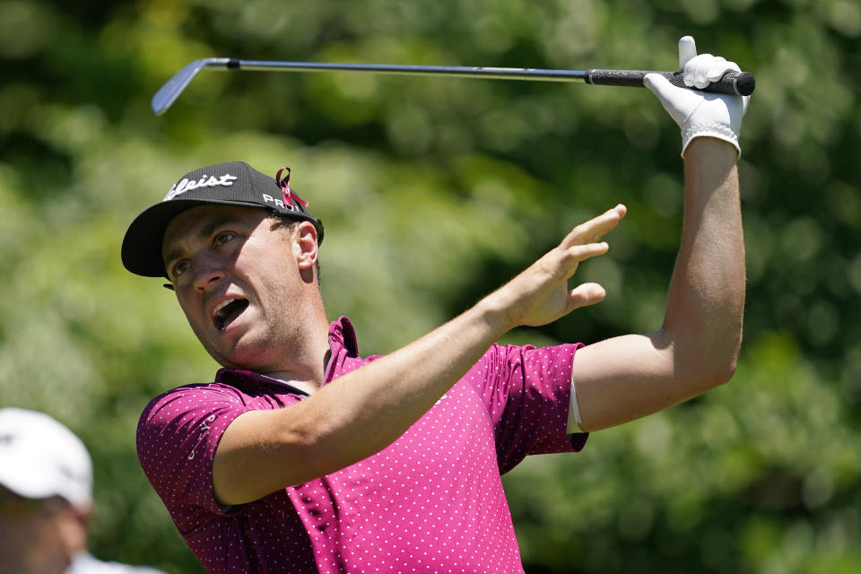Justin Thomas reacts to his shot off the eighth tee during the first round of the Charles Schwab Challenge golf tournament at the Colonial Country Club, Thursday, May 26, 2022, in Fort Worth, Texas. (AP Photo/Tony Gutierrez)
