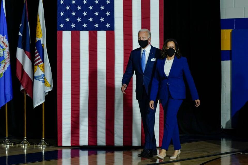 <p>Harris paired her simple ensemble with an important face mask - evidently making a statement - for her first official event as Biden's Democrat Vice Presidential running mate. </p>