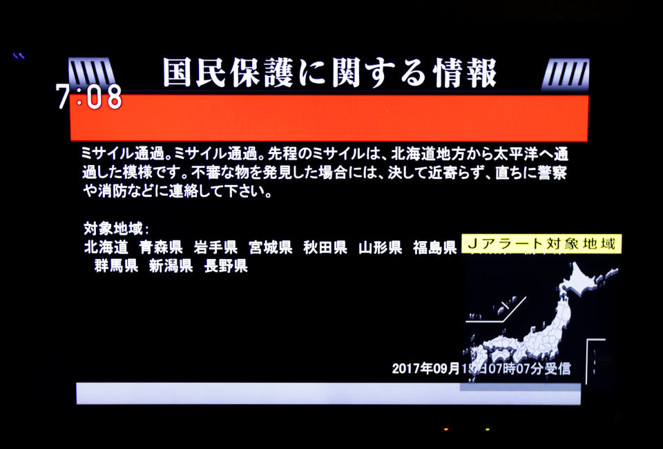 The Japanese government's alert message called J-alert notifying citizens of a ballistic missile launch by North Korea is seen on a television screen in Tokyo