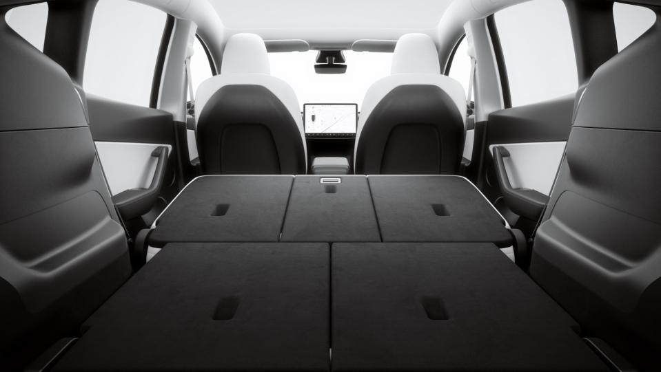 tesla model y's flat fold seats