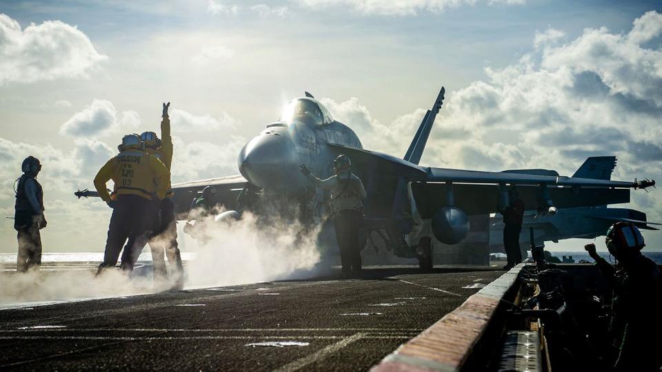 An F/A-18E Super Hornet with Strike Fighter Squadron 137 prepares to launch from the flight deck of the aircraft carrier Nimitz in the Philippine Sea Dec. 2. The Nimitz is in U.S. 7th fleet to ensure a free and open Indo-Pacific region. (MC2 Justin McTaggart/Navy)