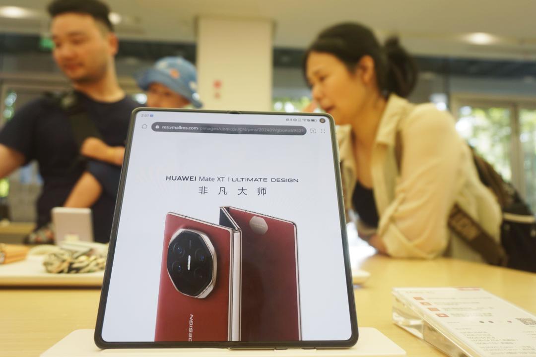 Hangzhou, China. 08th Sep, 2024. HANGZHOU, CHINA - SEPTEMBER 8, 2024 - The pre-order page of HUAWEI triple-foldable mobile phone HUAWEI Mate XT ULTIMATE is pictured at a Huawei store in Hangzhou, Zhejiang province, China, Sept 8, 2024. Huawei's first three-fold mobile phone opened its reservation at 12:08 on September 7, and as of 10:50 on September 8, less than 24 hours after the reservation opened, Huawei Mall showed that the number of reservations for the product had exceeded 2 million. (Photo by CFOTO/Sipa USA) Credit: Sipa US/Alamy Live News