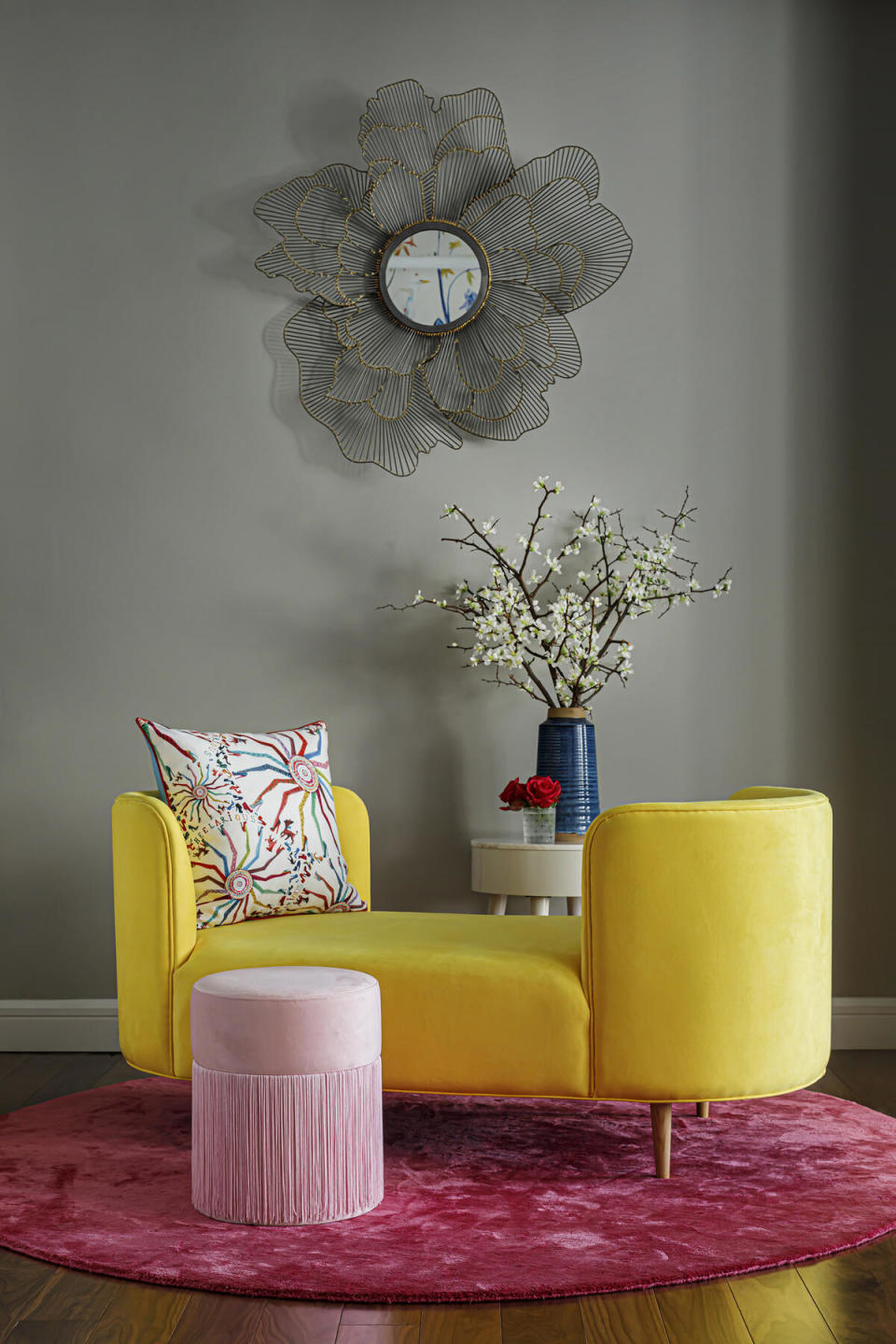 A contemporary tête-à-tête upholstered in Ultrasuede Sunshine yellow transformed the seating areas of a downtown Manhattan loft space