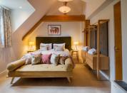 <p>Enjoy a fantastic stay in a dog’s paradise in the New Forest at <a href="https://www.petspyjamas.com/travel/location/new-park-manor-so42-7qh" rel="nofollow noopener" target="_blank" data-ylk="slk:New Park Manor;elm:context_link;itc:0;sec:content-canvas" class="link ">New Park Manor</a>. </p><p>There's plenty of space for long walks together and, while the dog catches up on sleep, you can splash around in the pool or relax in the spa. Local produce makes the restaurant a hit with all, including your pooch who is allowed to join you in the lounge for meals.</p><p>From £155 per night.</p>