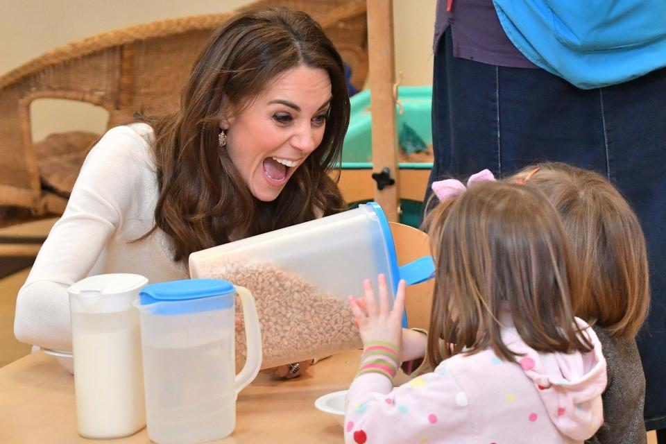 Kate meets some of the children at the pre-school in London (Getty Images)