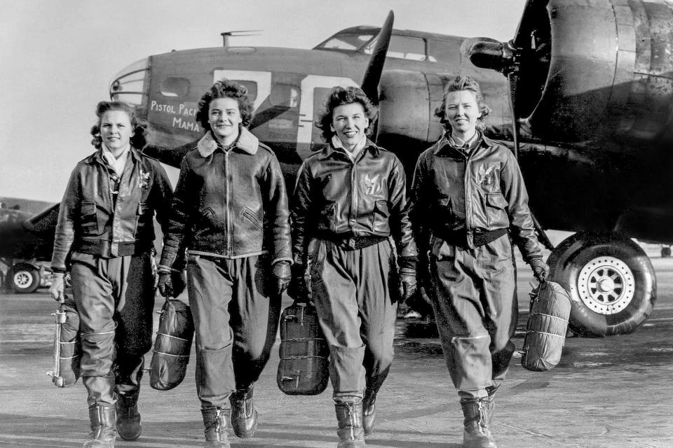 This World War II photos shows four female pilots, members of a group of WASPS who trained to ferry the B-17 Flying Fortresses.