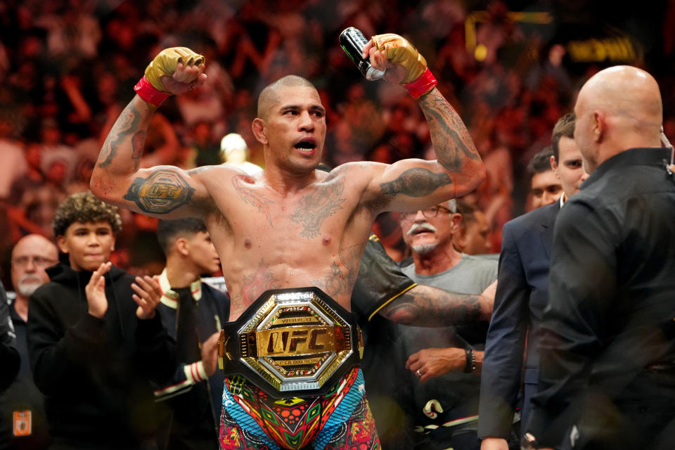 October 5, 2024; Salt Lake City, Utah, USA; Alex Pereira (red gloves) reacts after beating Khalil Rountree Jr. (not pictured) in a light heavyweight title fight at UFC 307 at Delta Center. Mandatory credits: Stephen R. Sylvanie-Imagn images