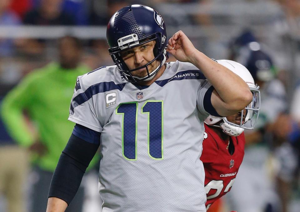 Sebastian Janikowski made a business decision when faced with tackling a kick returner on Sunday. (AP)