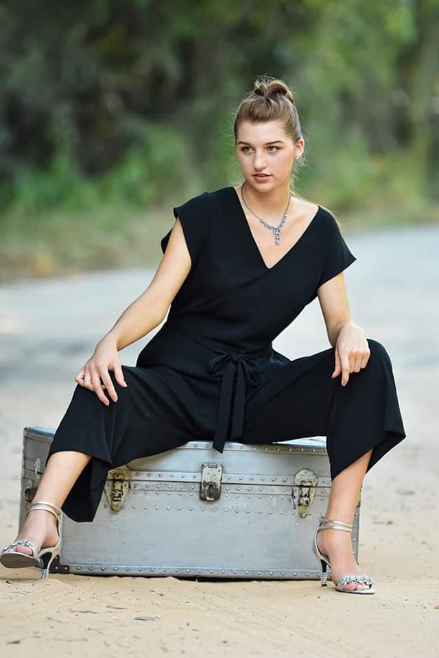 Florida teenager Darcy Krueger wearing this black jumpsuit that saw her refused entry to her school dance.