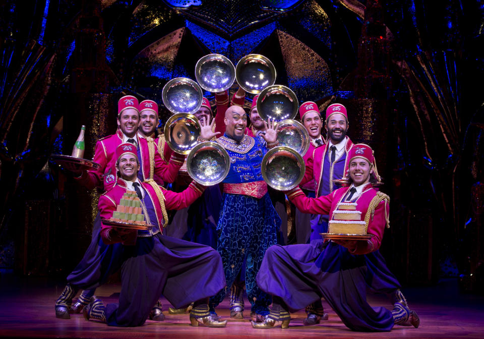 Gareth Jacobs (centre, in blue) as Genie in Disney's Aladdin musical. (Photo: Disney)