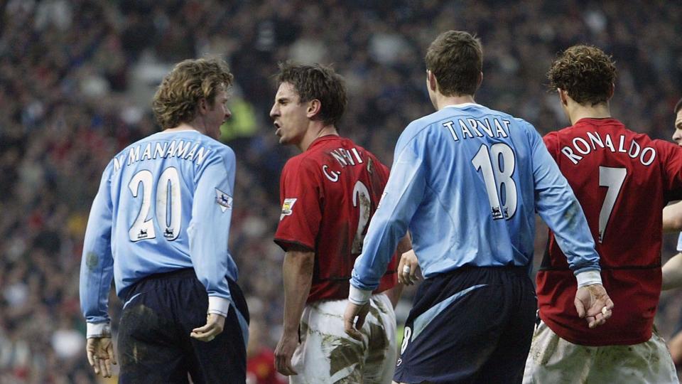 Steve McManaman and Gary Neville face each other in the fifth round of the 2004 FA Cup