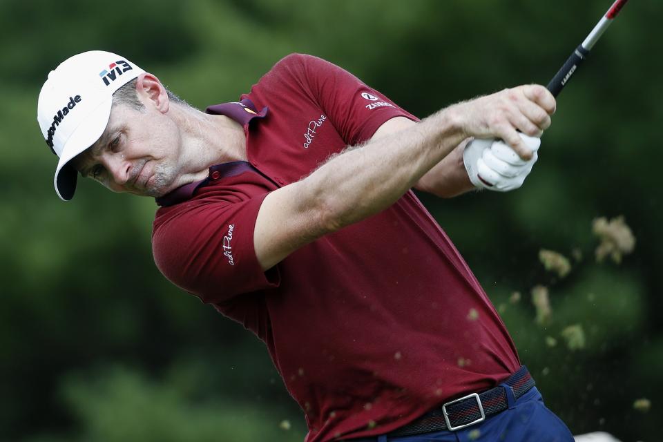 Justin Rose tees off on the third hole during the final round of the Dell Technologies Championship golf tournament at TPC Boston in Norton, Mass., Monday, Sept. 3, 2018. (AP Photo/Michael Dwyer)