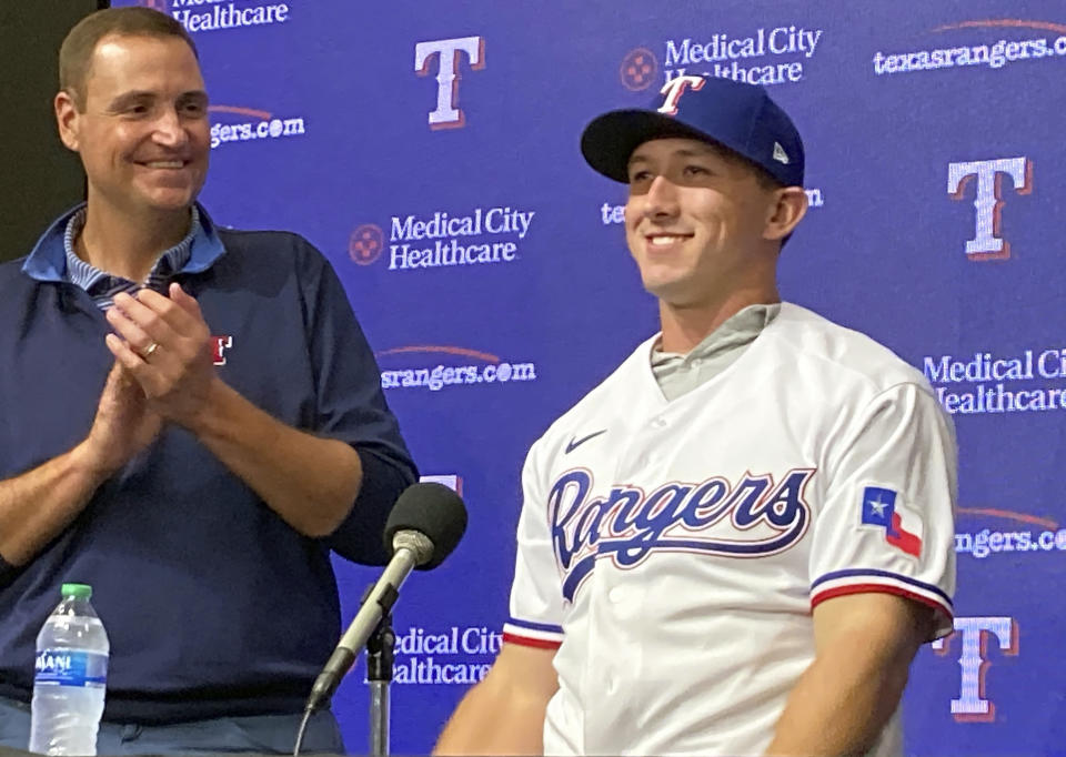 Wyatt Langford, the Florida outfielder the Texas Rangers drafted fourth overall on July 9, is introduced Tuesday at Globe Life Field in Arlington, Texas. Langford's $8 million signing bonus is the largest ever for a player drafted by the Rangers. (AP Photo/Stephen Hawkins)