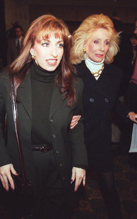 Paula Jones (L) and her advisor Susan Carpenter-McMillan (R) as they leave a press conference  - Credit: EPA