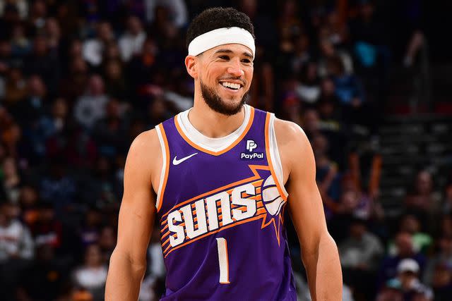 <p>Kate Frese/NBAE via Getty</p> Devin Booker during a game against the Memphis Grizzlies in January 2024