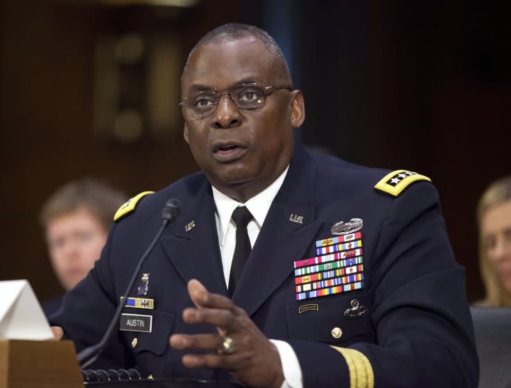 FILE - In this Sept. 16, 2015, photo, U.S. Central Command Commander Gen. Lloyd Austin III, testifies on Capitol Hill in Washington. Biden will nominate retired four-star Army general Lloyd J. Austin to be secretary of defense. That's according to three people familiar with the decision who spoke on condition of anonymity because the selection hadn't been formally announced. (AP Photo/Pablo Martinez Monsivais, File)