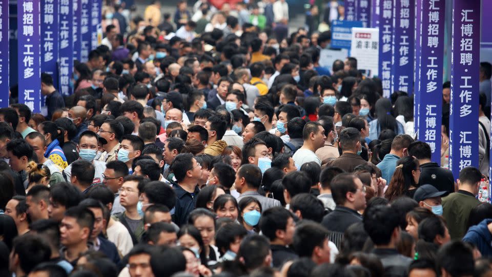 People attend a job fair in China's southwestern city of Chongqing last spring. - AFP/Getty Images