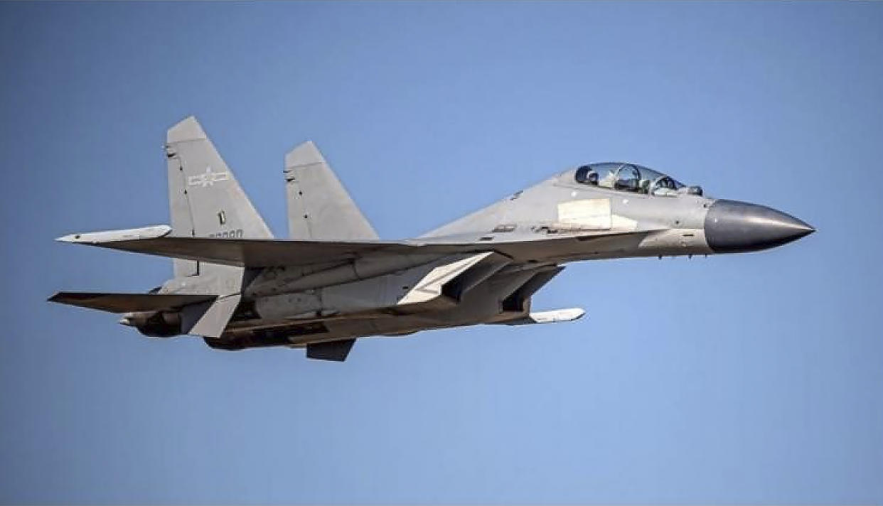 FILE -In this undated file photo released by the Taiwan Ministry of Defense, a Chinese PLA J-16 fighter jet flies in an undisclosed location. China flew more than 30 military planes toward Taiwan on Saturday, Oct. 2, 2021, the second large display of force in as many days. (Taiwan Ministry of Defense via AP, File)