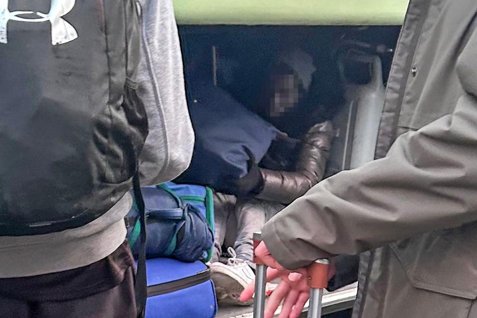 Two men were discovered in the luggage hold of the coach as it arrived back at Hounsdown School in Totton, Hampshire (Daily Echo/Solent News)