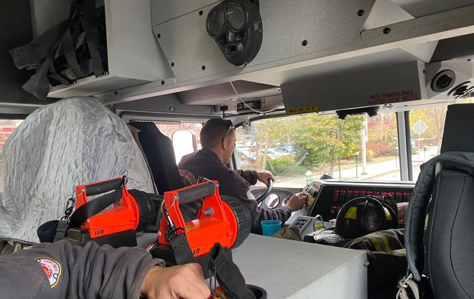 Providence firefighter Billy Mahoney at the wheel of Special Hazards 1.