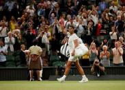 Tennis - Wimbledon - All England Lawn Tennis and Croquet Club, London, Britain - July 13, 2018 Spain's Rafael Nadal applauds as he walks off court after his semi final match against Serbia's Novak Djokovic was stopped due to the time REUTERS/Andrew Boyers