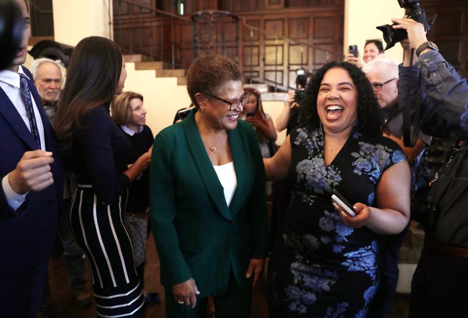 Karen Bass mingles after her election announcement at the Wilshire Ebell Theatre in Los Angeles on Nov. 17.