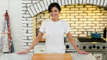 <p>Her new cooking show, <a href="https://people.com/food/selena-gomez-shares-behind-the-scenes-look-at-her-hbo-max-cooking-show/" rel="nofollow noopener" target="_blank" data-ylk="slk:Selena + Chef;elm:context_link;itc:0;sec:content-canvas" class="link "><em>Selena + Chef</em></a>, follows Gomez as she brushes up on her cooking skills while staying at home. The 10-episode series debuted on Aug. 13 and shows Gomez in self-isolation as she tries her hand at new recipes across a variety of cuisines. A different master chef joins her remotely each time to walk her through each dish and share invaluable tips and tricks.</p> <p>Each episode also highlights a different food-related charity.</p> <p>Gomez executive produced the series, collaborating again with Eli Holzman and Aaron Saidman (the three executive produced last year's Netflix docuseries <em>Living Undocumented</em>).</p>