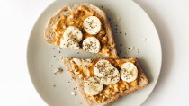 <p> Give your toast or porridge a nutritious boost with a dollop of nut butter, such as almond or cashew. Not only will it add flavour to your breakfast, but nuts are packed with nutrients such as 'good' fats, magnesium and potassium. A <a href="https://www.nejm.org/doi/full/10.1056/NEJMoa1307352#t=article" rel="nofollow noopener" target="_blank" data-ylk="slk:study in the New England Journal of Medicine;elm:context_link;itc:0;sec:content-canvas" class="link ">study in the New England Journal of Medicine</a> showed that those who consumed them more than seven times per week had a 20 per cent lower risk of death compared to those who went without. The authors of the study, which was conducted over 30 years, were keen to note that the large study cannot definitively prove cause and effect - but it does, nonetheless, prove the health benefits of regularly eating nuts. </p>