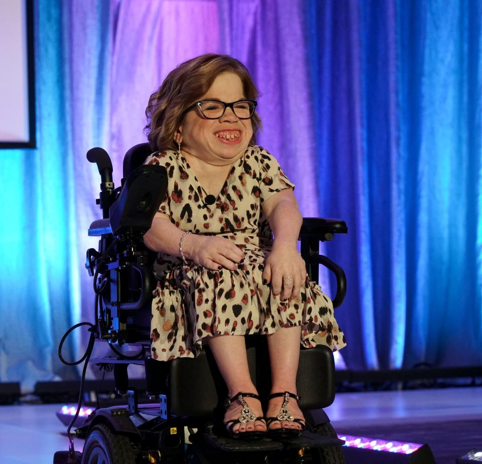 Kendra Gottsleben, the founder and executive director of Rare by Design, smiles as her fashion show comes to an end on Saturday, May 7, 2022.