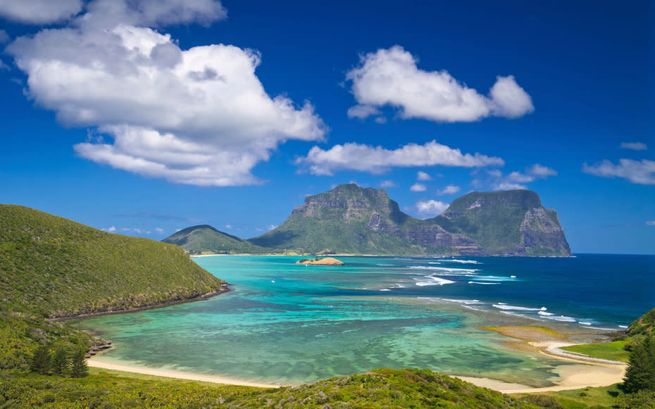 <p>If you're looking to truly unplug, this tiny Pacific Ocean island between Australia and New Zealand is the answer. Just a two-hour flight from Sydney, it’s a close-kept secret among Australians who come to snorkel the coral lagoons and explore the volcanic mountains. At <a rel="nofollow noopener" href="https://www.tripadvisor.com/Attraction_Review-g528988-d588670-Reviews-Ned_s_Beach-Lord_Howe_Island.html" target="_blank" data-ylk="slk:Ned’s Beach;elm:context_link;itc:0;sec:content-canvas" class="link ">Ned’s Beach</a> you can hand feed kingfish (a Lord Howe specialty) or watch turtles lazing in the sand at <a rel="nofollow noopener" href="https://www.lordhoweisland.info/points-of-interest/points-of-interest/old-settlement/" target="_blank" data-ylk="slk:Old Settlement Beach;elm:context_link;itc:0;sec:content-canvas" class="link ">Old Settlement Beach</a>.</p>