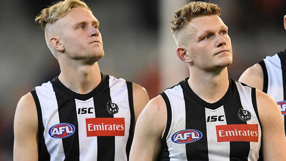 Jaidyn Stephenson and Adam Treloar, pictured here in action for Collingwood.