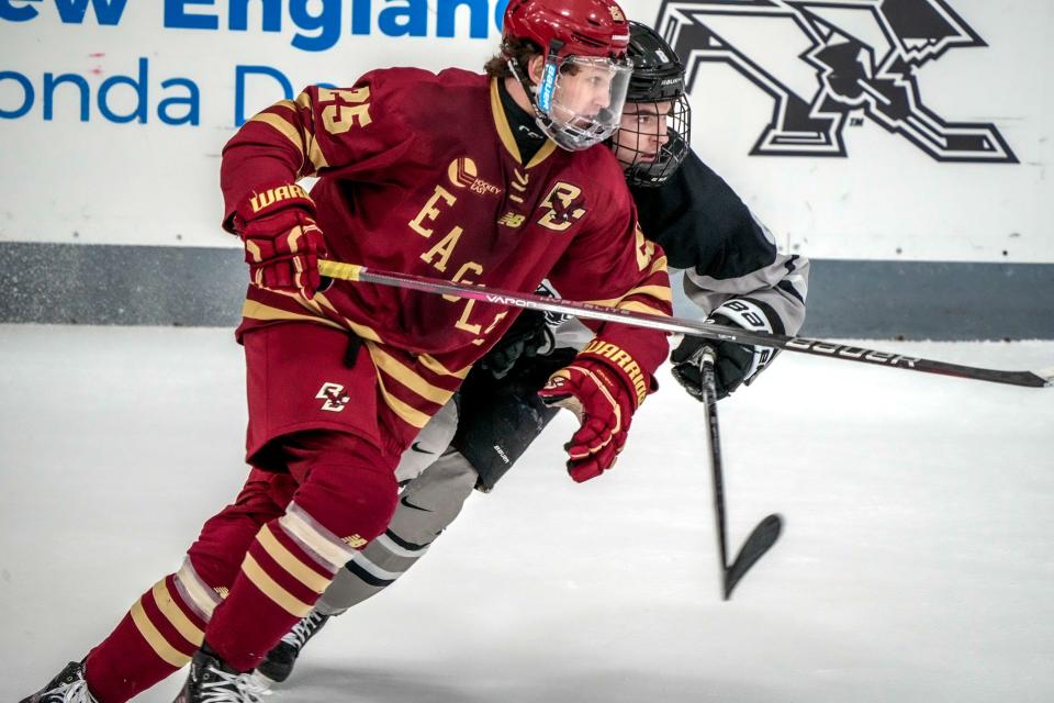 Boston College's Jamie Armstrong, left, battles Providence College's Riley Duran in their Jan. 13 clash at Schneider Arena. (PC won, 4-3.) BC is the nation's top team and will play in the opening round of the NCAA men's hockey tournament Friday in Providence against Michigan Tech.