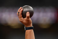 <p>New Zealand's Valerie Adams holds a shot prior to compete in the women's shot put qualification on July 30.</p>