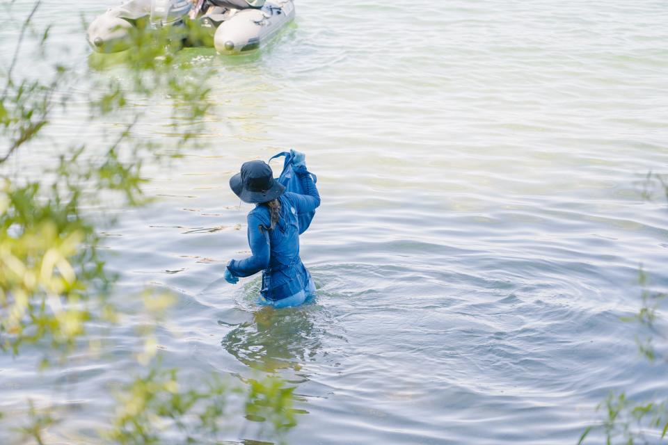 A diver removes trash from Lake Tahoe's waters near Zephyr Shoals