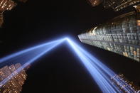 <p>In a photo taken with a fisheye lens, the two beams of light meet in the art installation âThe Tribute in Lightâ projecting in the night sky over Manhattan on Sept. 11, 2017. (Gordon Donovan) </p>