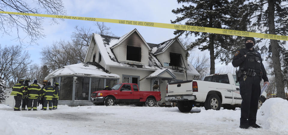 Firefighters work at the scene of a house fire on the 700 block of W. Oakton that claimed the lives of 5 people, Wednesday, Jan. 27, 2021 in Des Plaines, Ill. (Mark Welsh/Daily Herald via AP)