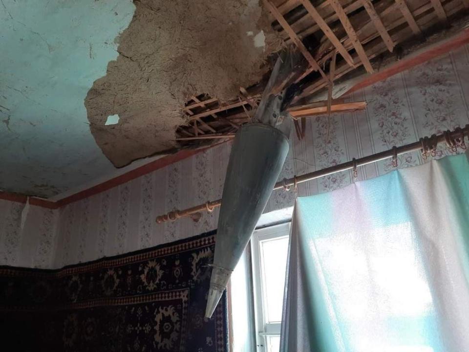 An unexploded  rocket wedged in an apartment building in the city (Kim Sengupta)