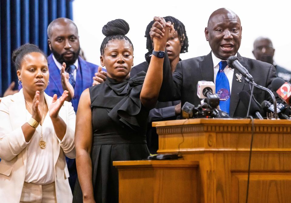 ÒWe want a conviction,Ó Civil Rights Attorney Ben Crump siaid while holding the hand of Pamela Dias, the mother of Ajike "AJ" Shantrell Owens, during a press conference Wednesday. About 100 people gathered for a press conference with Civil Rights Attorney Ben Crump Wednesday afternoon, June 7, 2023 at the New St. John Missionary Baptist Church in Ocala, FL. An arrest was made late Tuesday, early Wednesday morning in the fatal shooting of Ajike "AJ" Shantrell Owens. Crump represents the family. Owens was shot while standing outside her neighbor's door the night of June 2 in Quail Run, located off County Road 475A in Ocala. Quail Run consist of single story duplex and quadraplex. Susan Louise Lorincz, 58, now faces charges of manslaughter with a firearm, culpable negligence, two counts of assault and battery. [Doug Engle/Ocala Star Banner]2023