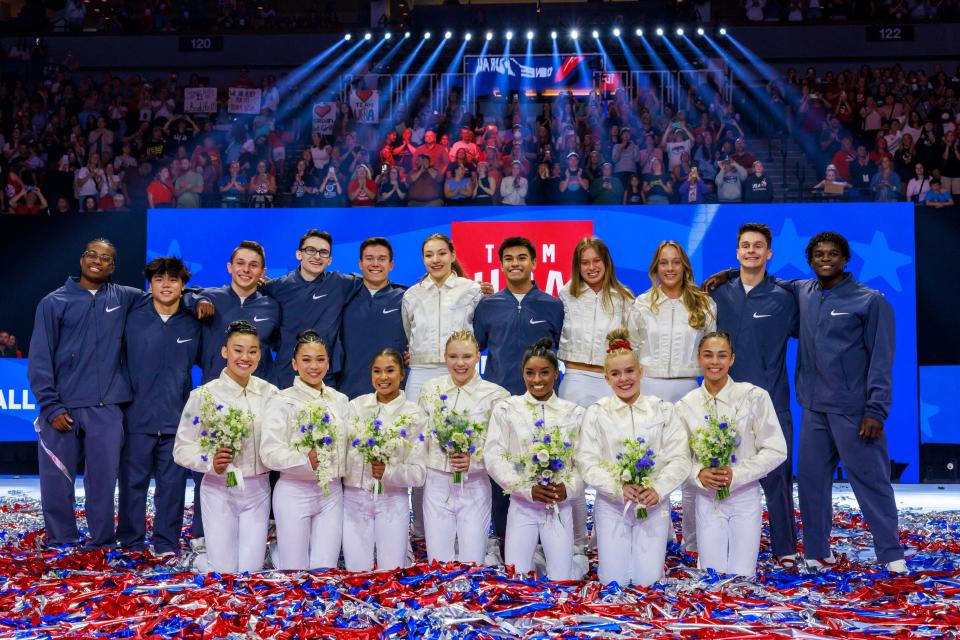 US gymnasts pose after being selected for the 2024 US Olympics Gymnastics Team in Minneapolis, Minnesota, on June 30, 2024.
