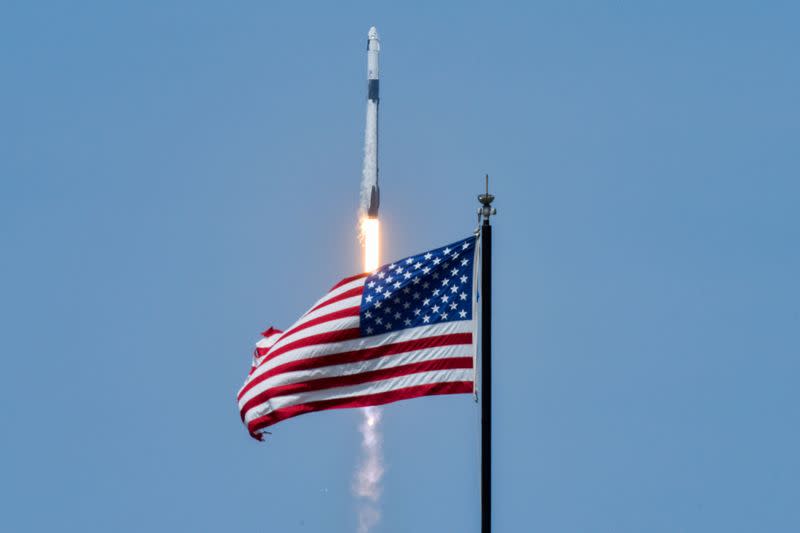 A SpaceX Falcon 9 rocket and Crew Dragon spacecraft carrying NASA astronauts Douglas Hurley and Robert Behnken lifts off during NASA's SpaceX Demo-2 mission to the International Space Station from NASA's Kennedy Space Center in Cape Canaveral