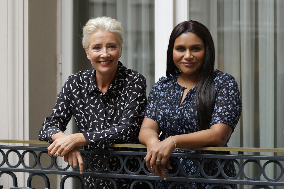 This May 17, 2019 photo shows British actress Emma Thompson and U.S. actress and screenwriter Mindy Kaling posing on a hotel balcony in London to promote their film, "Late Night." (AP Photo/Matt Dunham)