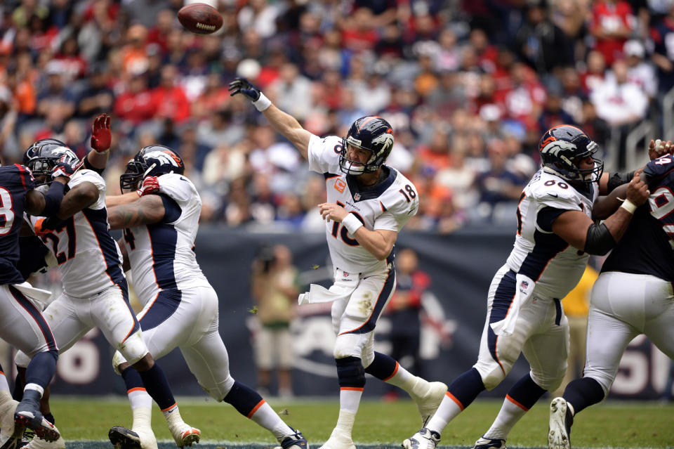 Peyton Manning y los Denver Broncos anotaron 606 puntos en 2013, la cifra más alta en una temporada en la historia de la NFL. (Photo by John Leyba/The Denver Post via Getty Images)