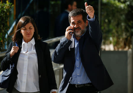 FILE PHOTO: Jordi Sanchez, a Catalan separatist leader, gestures as he leaves Spain's High Court in Madrid, October 16, 2017. REUTERS/Javier Barbancho/File Photo