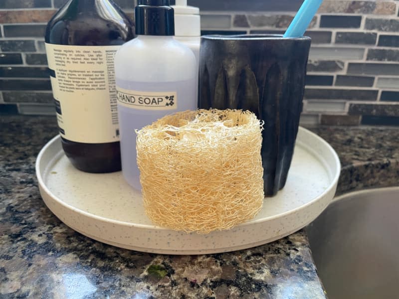 Natural luffa near kitchen sink.