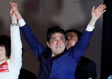Japan's Prime Minister Shinzo Abe, leader of the Liberal Democratic Party, gestures at an election campaign rally in Tokyo, Japan October 21, 2017. REUTERS/Kim Kyung-Hoon