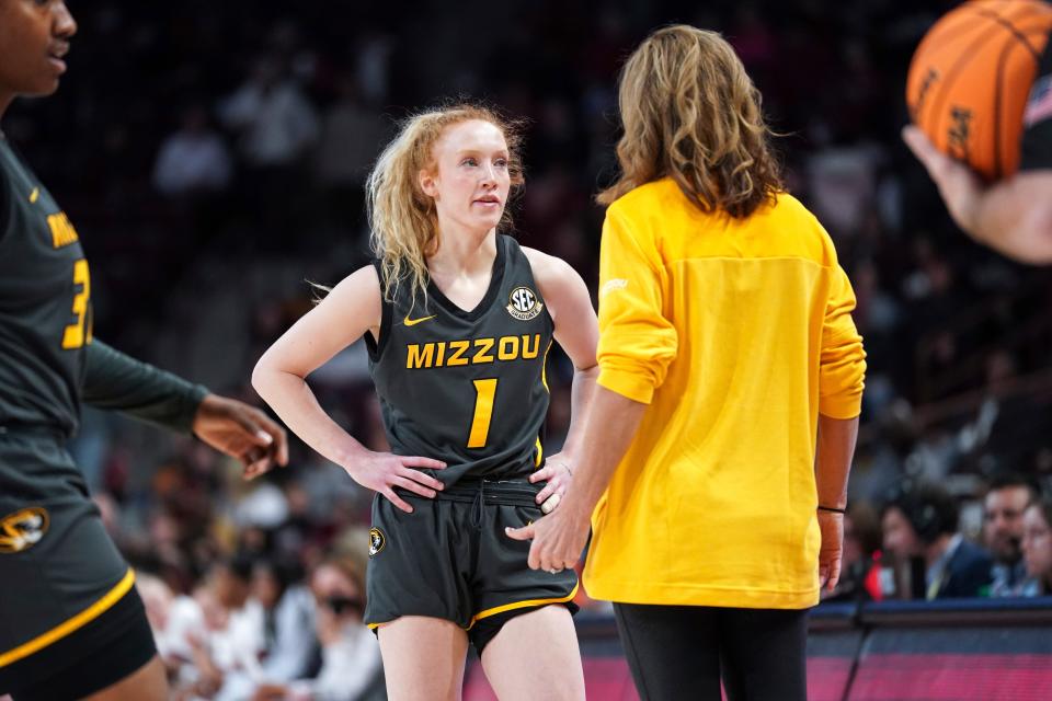 Missouri guard Lauren Hansen (1) listens to head coach Robin Pingeton during the first half of an NCAA college basketball game against South Carolina Sunday, Jan. 15, 2023, in Columbia, S.C. South Carolina won 81-51.