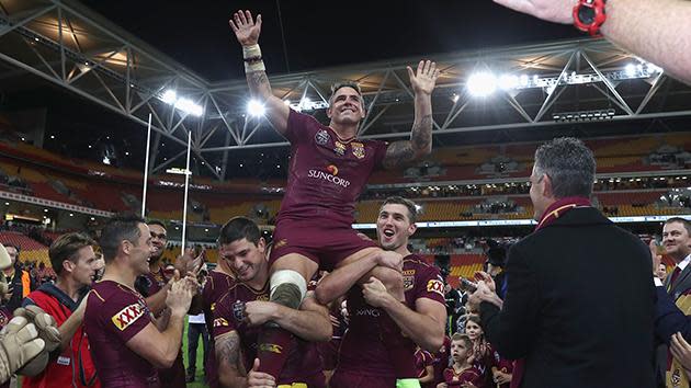 Corey Parker is chaired off at Suncorp.