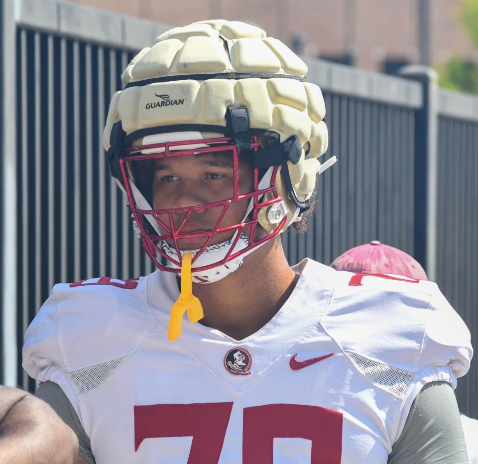 Florida State football and coaches and players, including offensive lineman Lucas Simmons, arrive for the 10th FSU spring football practice of the 2023 season on Tuesday, April 4, 2023.